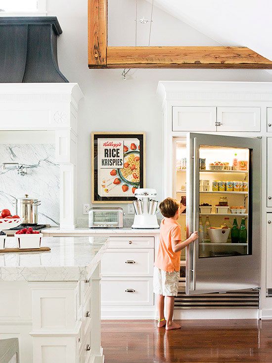 A glass door fridge is a great idea to make your kitchen feel more modern than it is, or just a perfect fit for a modern one.