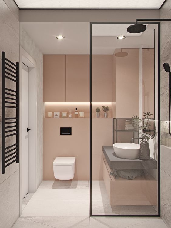Blush walls and cabinets plus white marble for a modern and laconic bathroom.