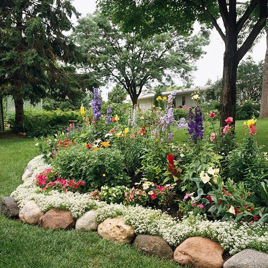 Large rocks are a nice idea to highlight your garden beds and they bring a natural feel to the space.