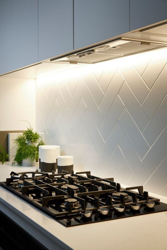 Dont' forget of a stylish backsplash by the stovetop to keep the wall safe and cool.