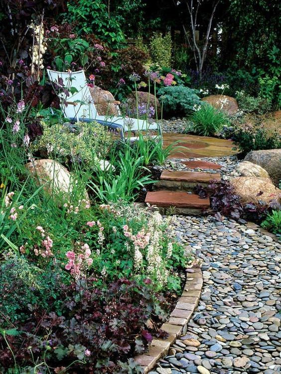 Brick edging and a pebble path is a stylish idea - you'll get a natural feel and a touch of well-grooming at the same time.