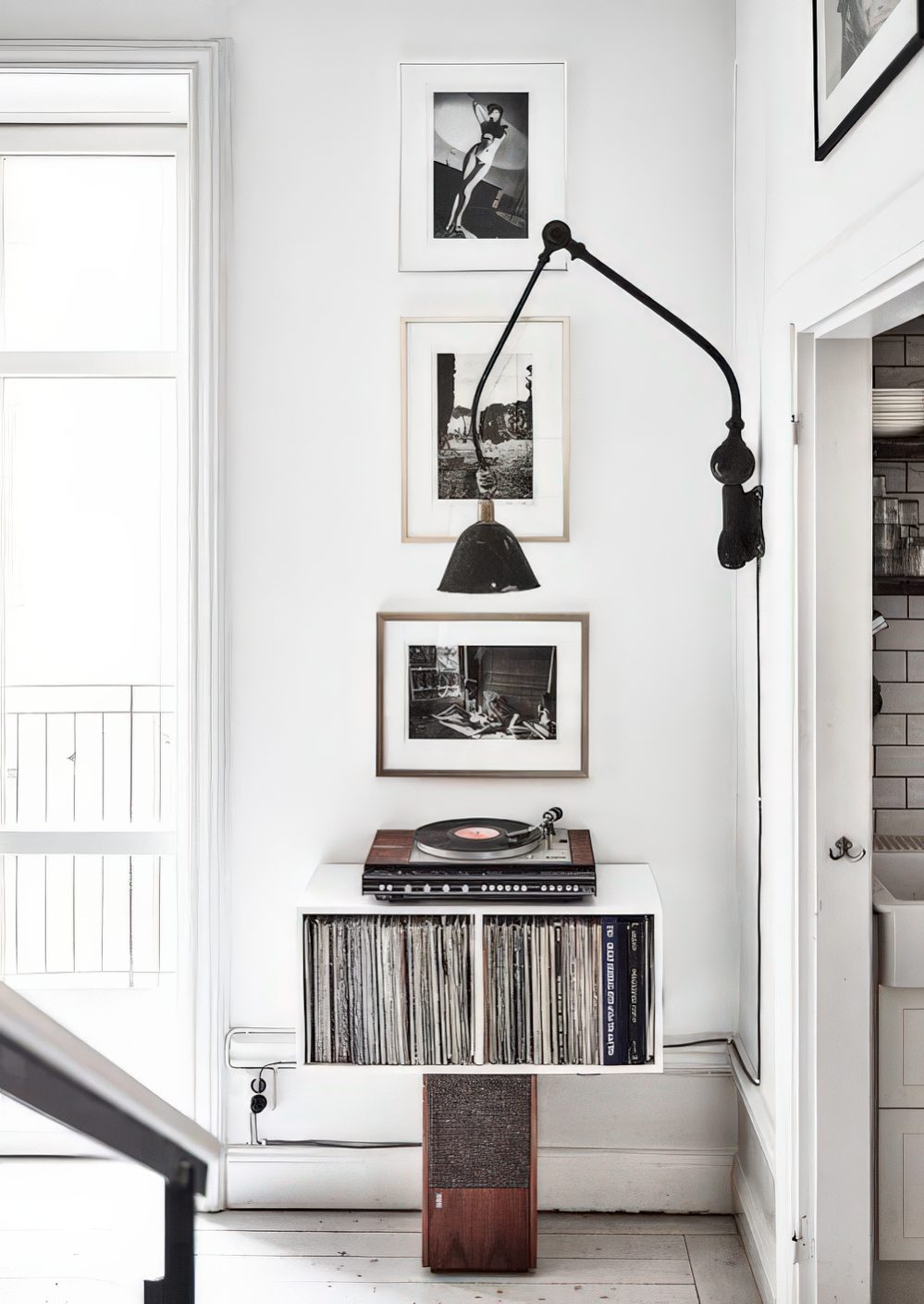 A small nook used for storing vinyl and for playing it too - only for melomans and vintage lovers.