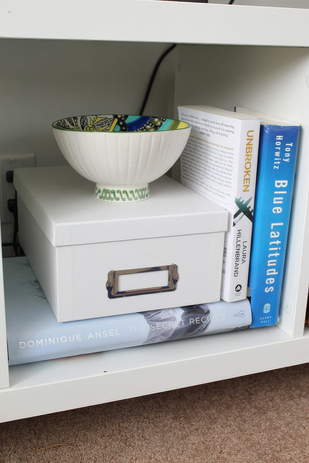 A stylish box covering a wi-fi router is a lovely idea for any space, and such a box will fit many styles and decor.