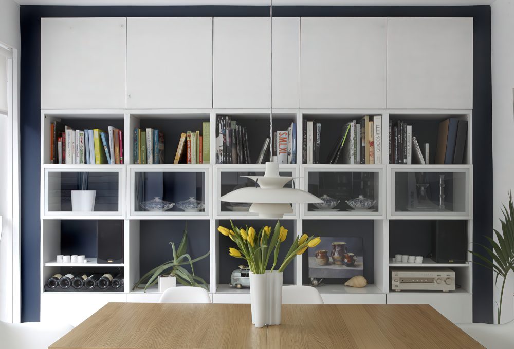 By mixing laminate and glass doors doors with open shelves you can get storage for everything you need.  (Optimise Design).