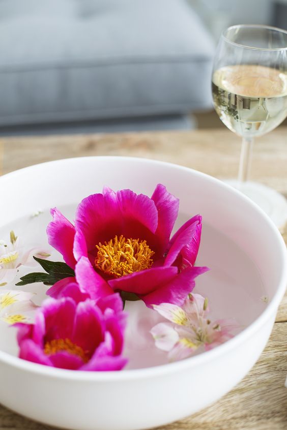 A bowl with floating bright blooms is a beautiful and simple summer centerpiece or decoration.