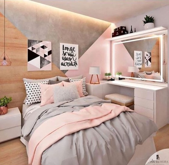 A modern teen girl bedroom with grey and pink decor, wih graphic artworks, neon lights and built-ins.