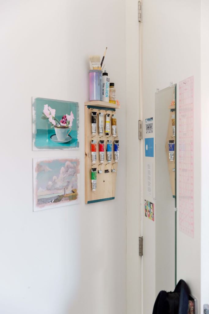 Add a small board with hooks to the wall in your craft room, and you will be able to place some supplies there.