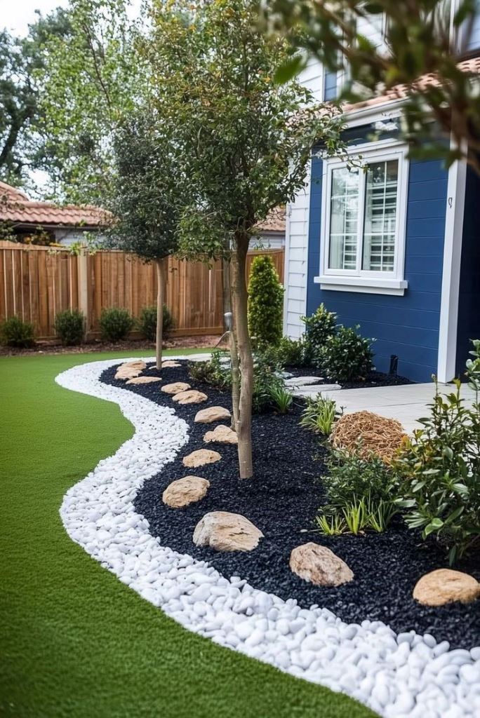 The easiest way to add trendy curves to your garden is to hardscape: there gravel is paired with contrasting rocks, and the planters are minimal and modern.