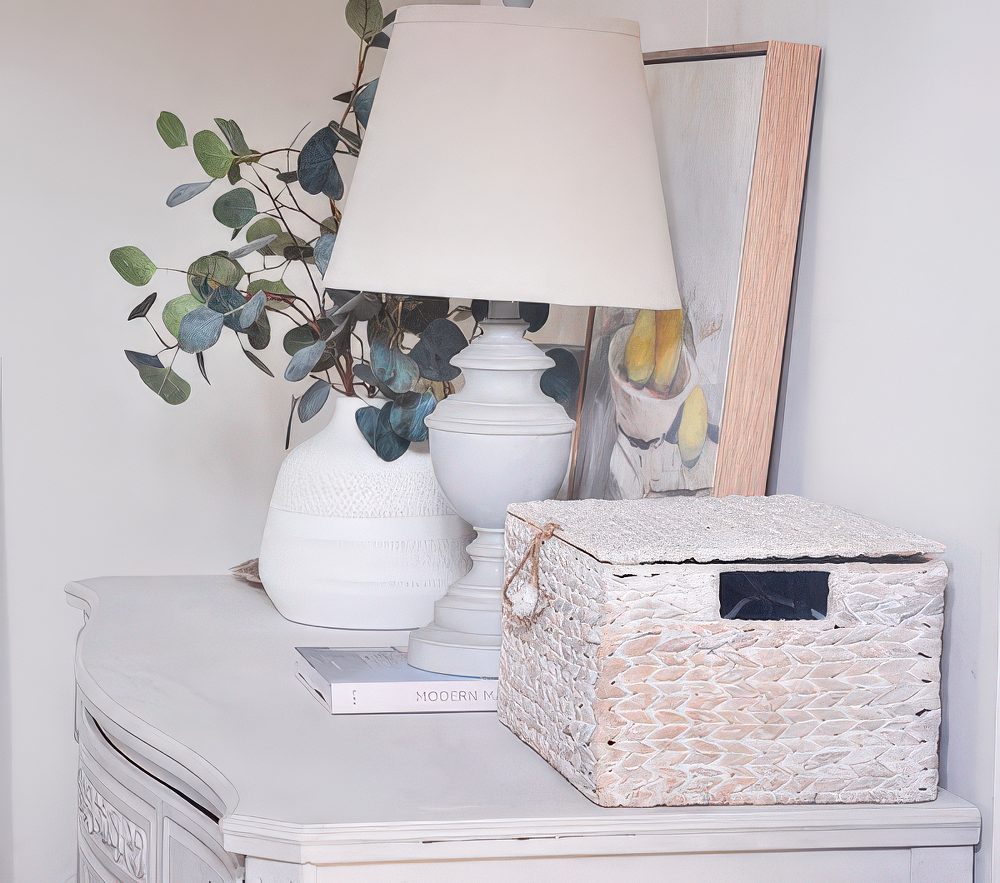 A chunky woven basket works double duty: homey vibe on the outside, hidden tech tangle on the inside. No one will ever know.

(@hydrangeatreehouse).