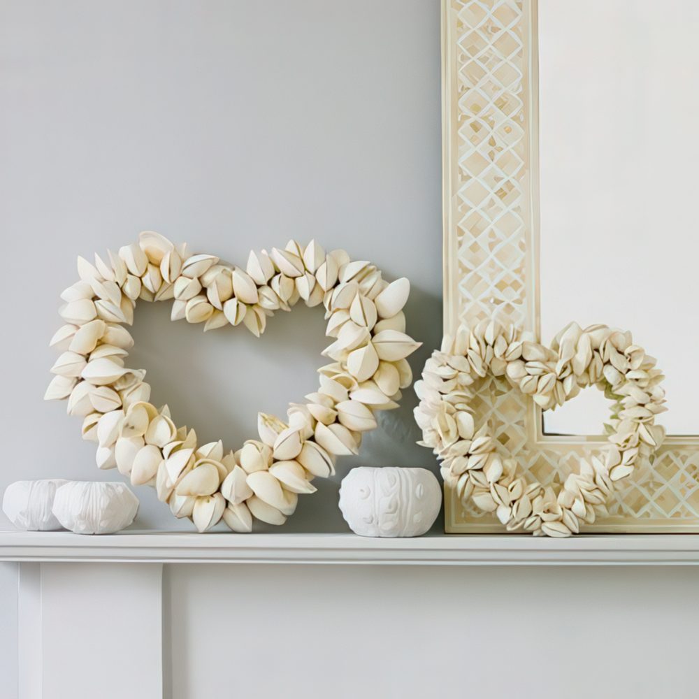 Make cute seashell heart wreaths to decorate your home and make it look and feel coastal and cool.