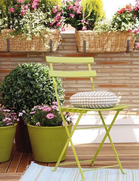 Lots of baskets and planters with summer blooms will turn any of your outdoor spaces into a summer paradise.