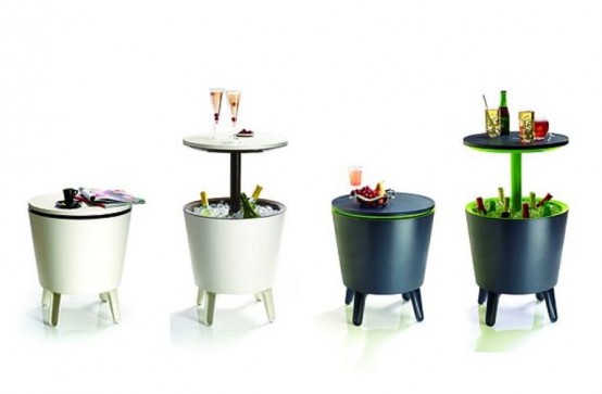 Outdoor Bar With A Table And A Fridge Under It