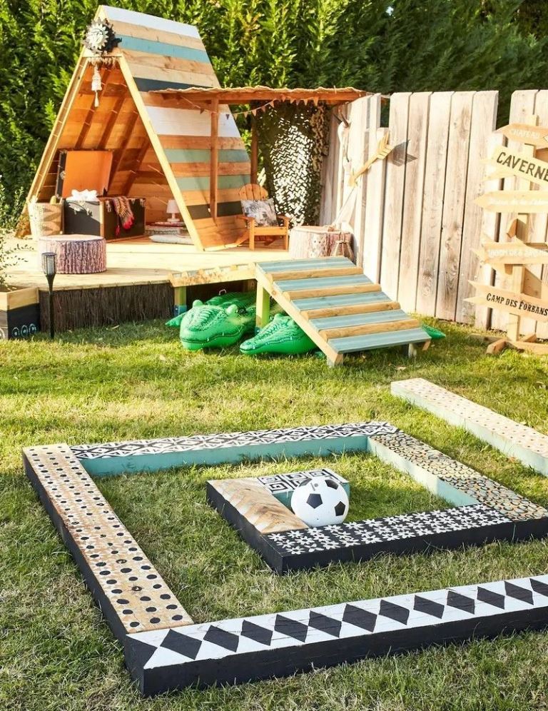 A pallet teepee and deck will be a lovely playspace for children, add furniture, decor and toys.