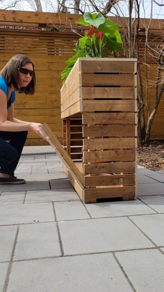 If you are making a tall slatted planter, add storage space inside.