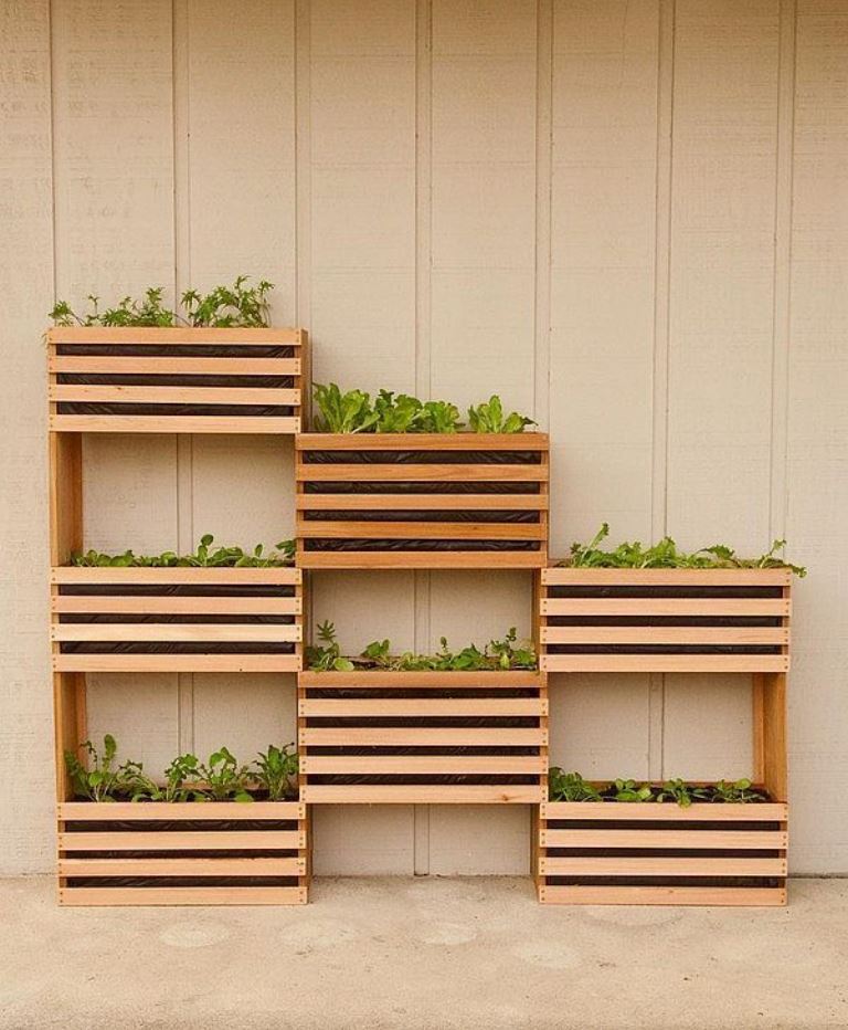 This planter system is built of several slat planters, and it's a cool way to save the space while growing more.

(via wonderfuldiy).