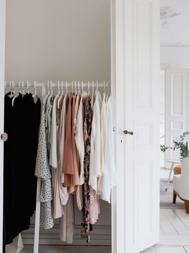 Your makeshift closet can be placed behind the door, so you won't see it too much.