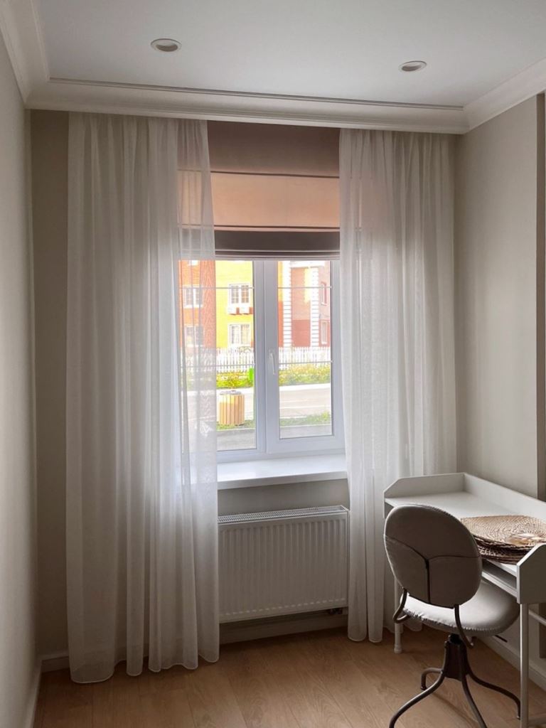 Using layered treatments is a smart idea not only to block the views but also to keep the room private.