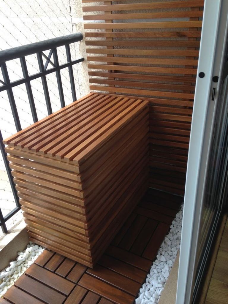 Slatted items are very trendy now, and you can make one for covering an AC unit, too.