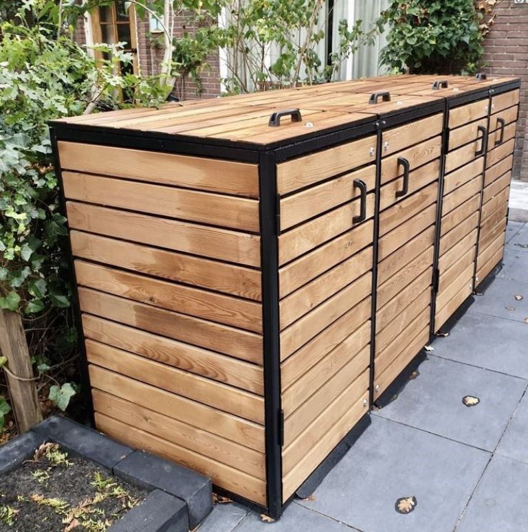The large slatted box can hide four trash cans, and metal frames make it durable.