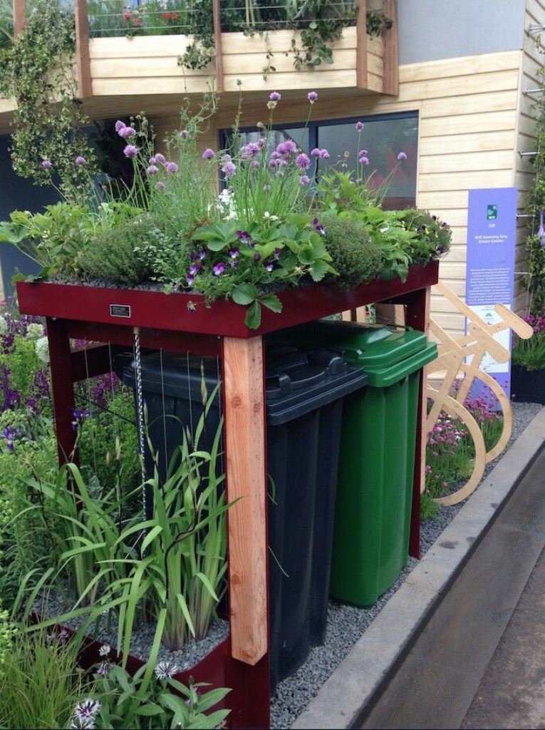 This isn't a cover, it's a stand with a tray on top and bright and cool blooms for a modern feel.