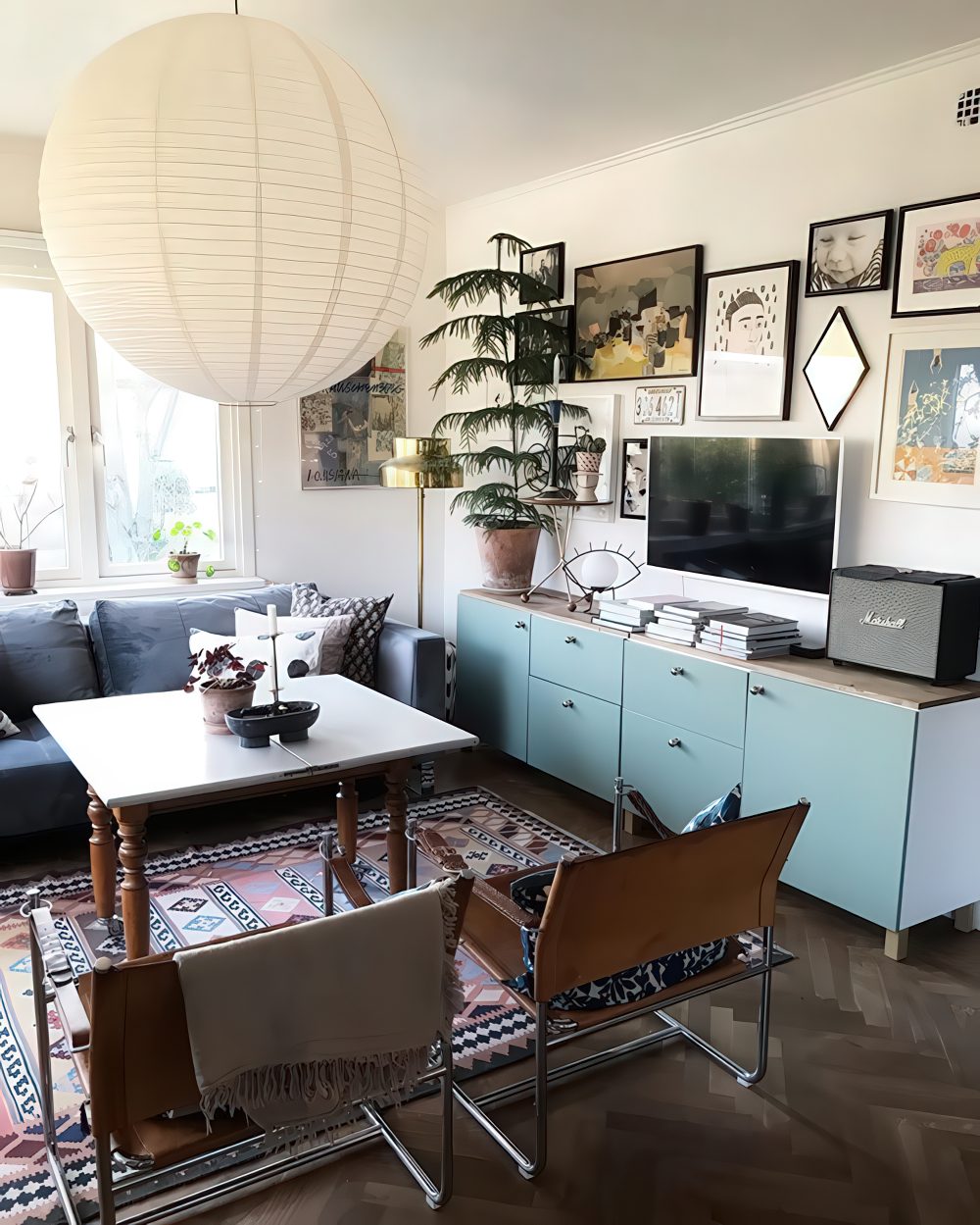 Mixing turquoise doors with wooden countertop is a great way to make your media console stylish (my_habitual_life).