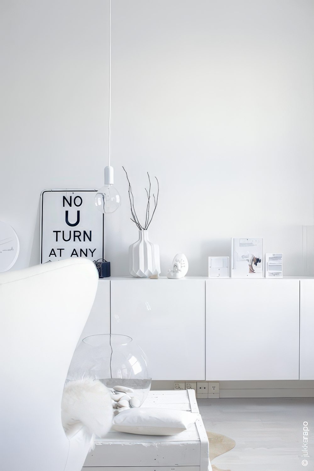 Simple White IKEA Besta hanging storage.